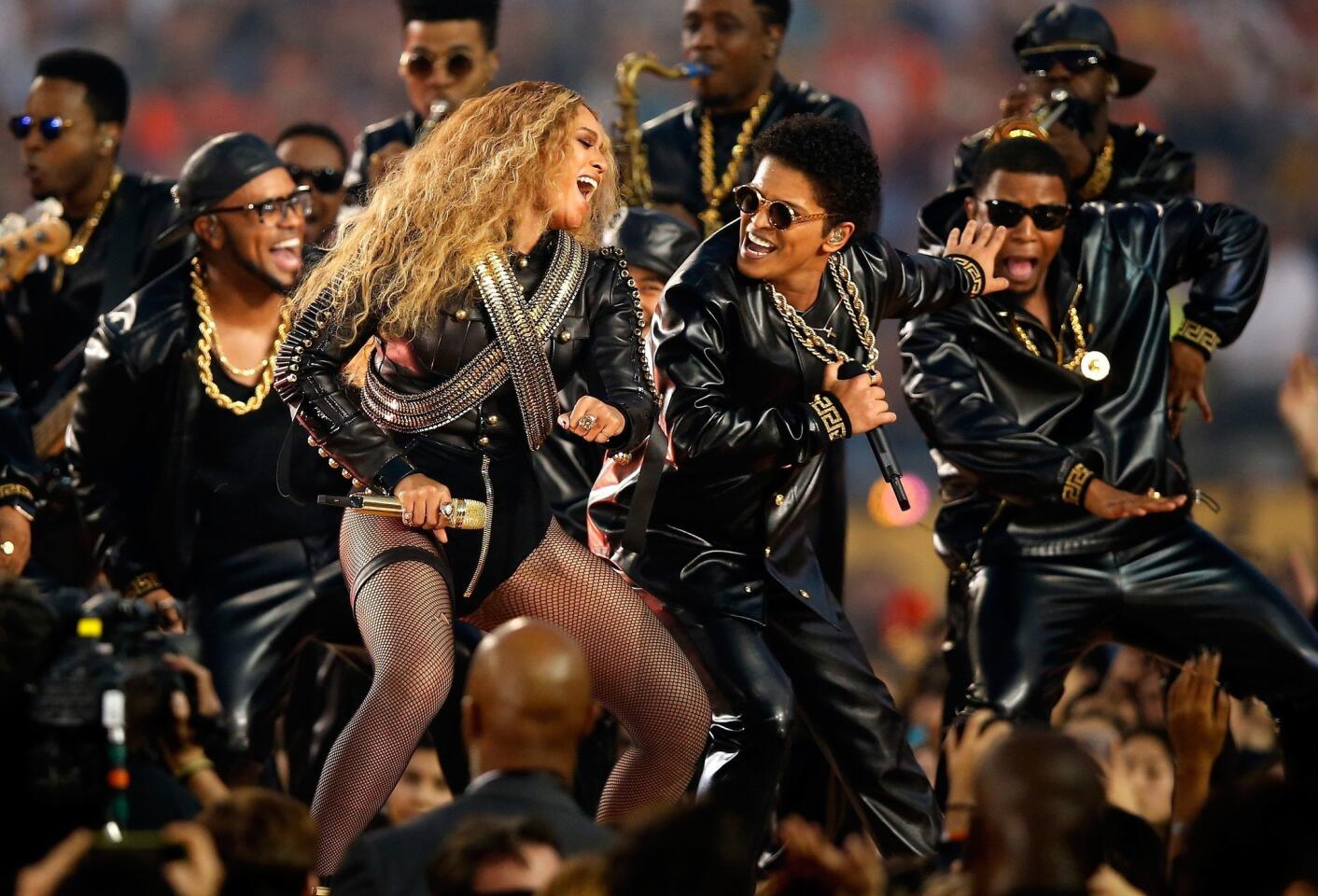 Beyonce and Bruno Mars perform during the Pepsi Super Bowl 50 Halftime Show. Photo by Ezra Shaw/Getty Images