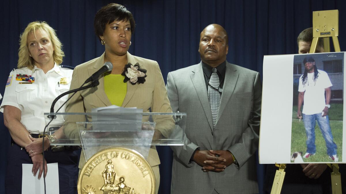 Washington Mayor Muriel Bowser speaks Thursday at a news conference about the slayings of a couple, their son and their housekeeper. She is joined by D.C. Police Chief Cathy Lanier and Charlie Smith, special agent in charge of the Washington field division of the U.S. Bureau of Alcohol, Tobacco, Firearms and Explosives.