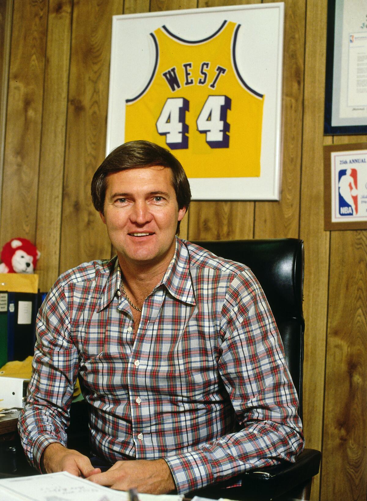 Jerry West sits at his desk at the Forum in 1987 during his stint as general manager of the Lakers.
