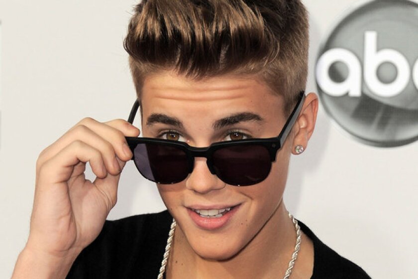 Justin Bieber Appears To Be Smoking Pot In Party Pictures Los Angeles Times