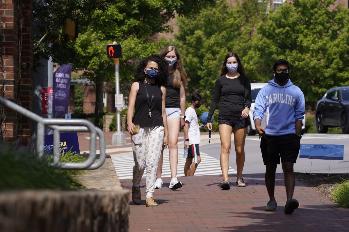 Students wear masks on campus at the University of North Carolina in Chapel Hill.