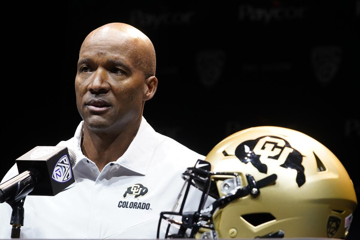 Colorado coach Karl Dorrell speaks during Pac-12 media day in July.