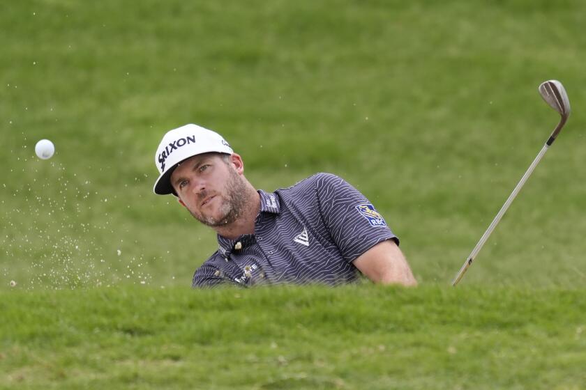 Taylor Pendrith hits from the sand on the sixth green during the final round of the Byron Nelson golf tournament in McKinney, Texas, Sunday, May 5, 2024. (AP Photo/LM Otero)