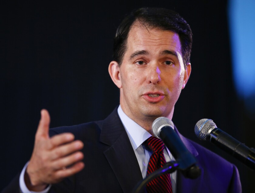 Vote for me, but not for thee? Wisconsin Republican Gov. Scott Walker 's voter ID law has been put on hold by the Supreme Court.
