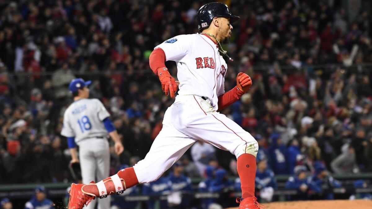 Red Sox's Mookie Betts hits a double.