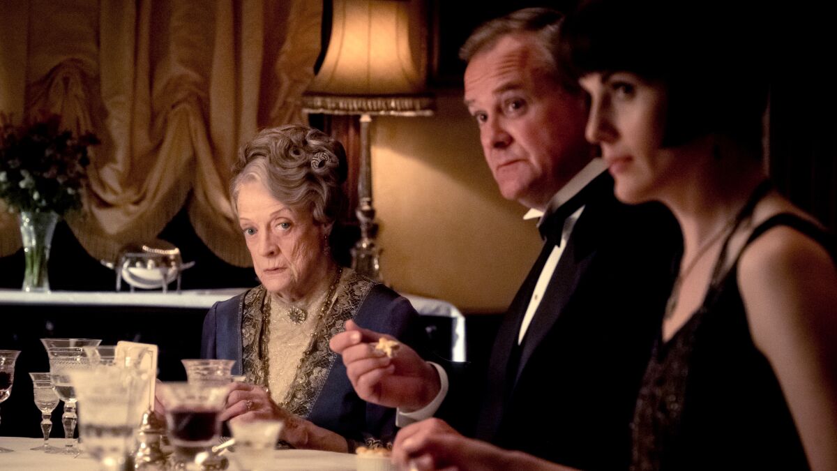 Maggie Smith, left, Hugh Bonneville and Michelle Dockery in "Return to Downton Abbey: A Grand Event" on NBC.