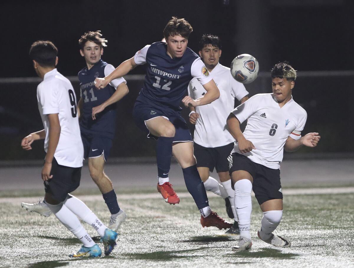 Newport Harbor's Harutyn Kelyan (12) kicks a shot on goal against Oxnard Pacifica on Tuesday.