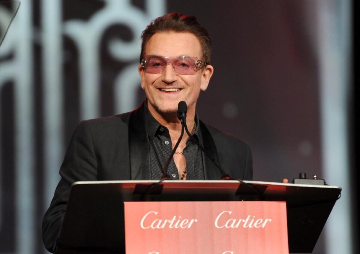 U2 singer Bono accepts the Sonny Bono Visionary Award at the Palm Springs International Film Festival.