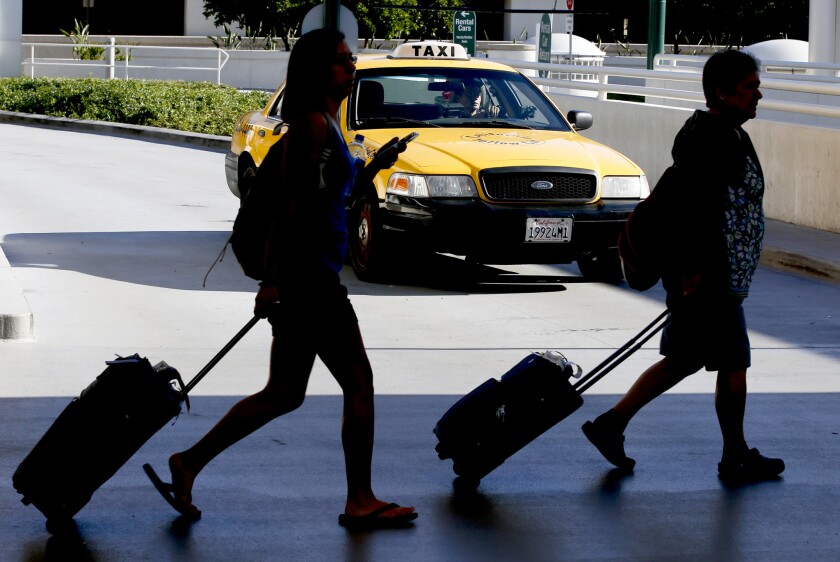 Travelers at John Wayne Airport will soon have more choices when it comes to taxi service.