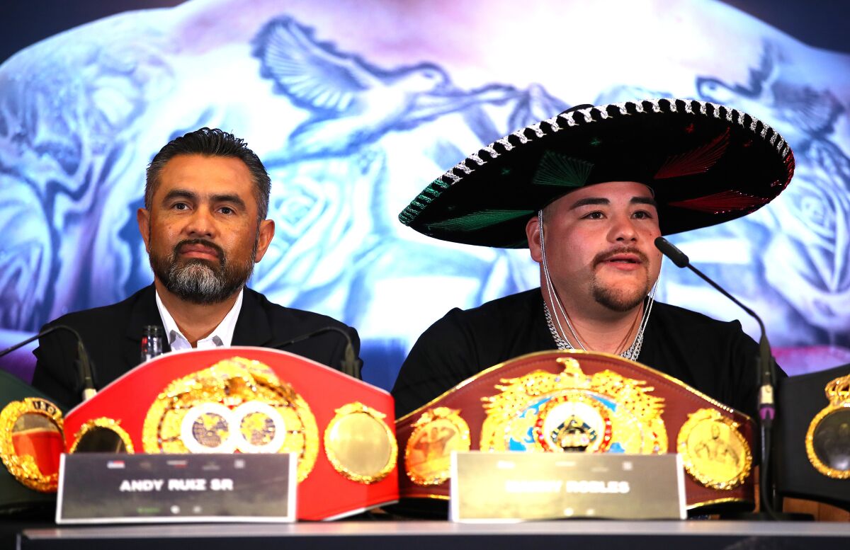 Andy Ruiz Jr. and Manny Robles address reporters during a news conference Sept. 6 in London.