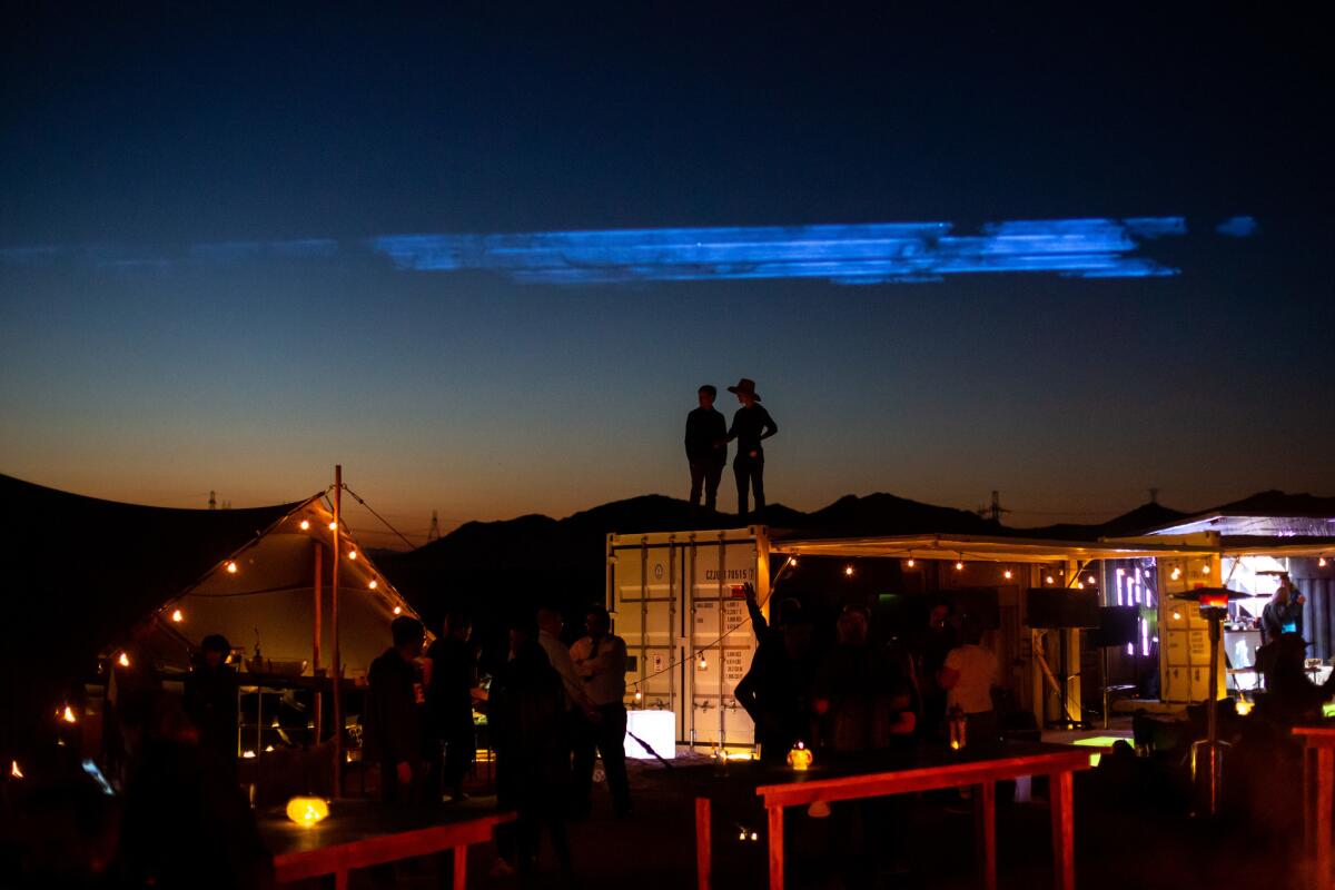 People hang out at the BetaSpace site in the Mojave Desert.