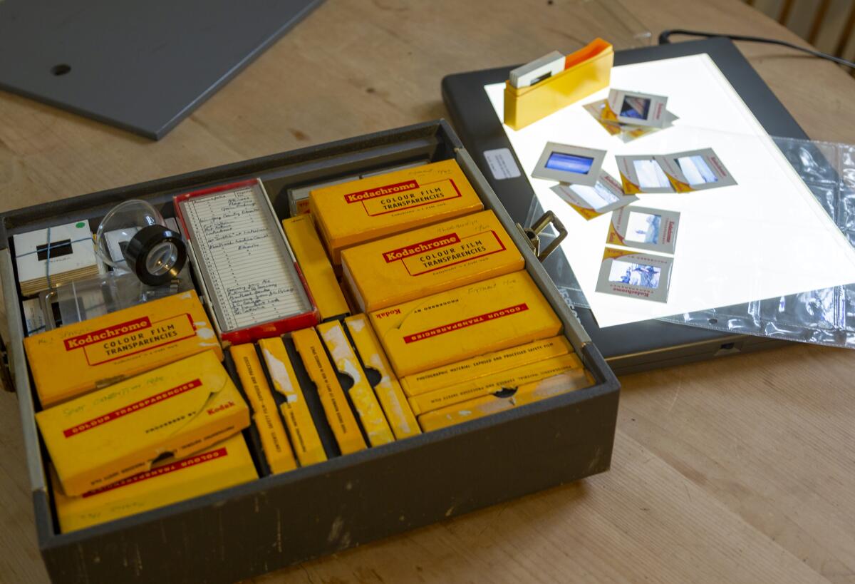 Yellow film storage boxes holding Kodachrome vintage transparency slides. 