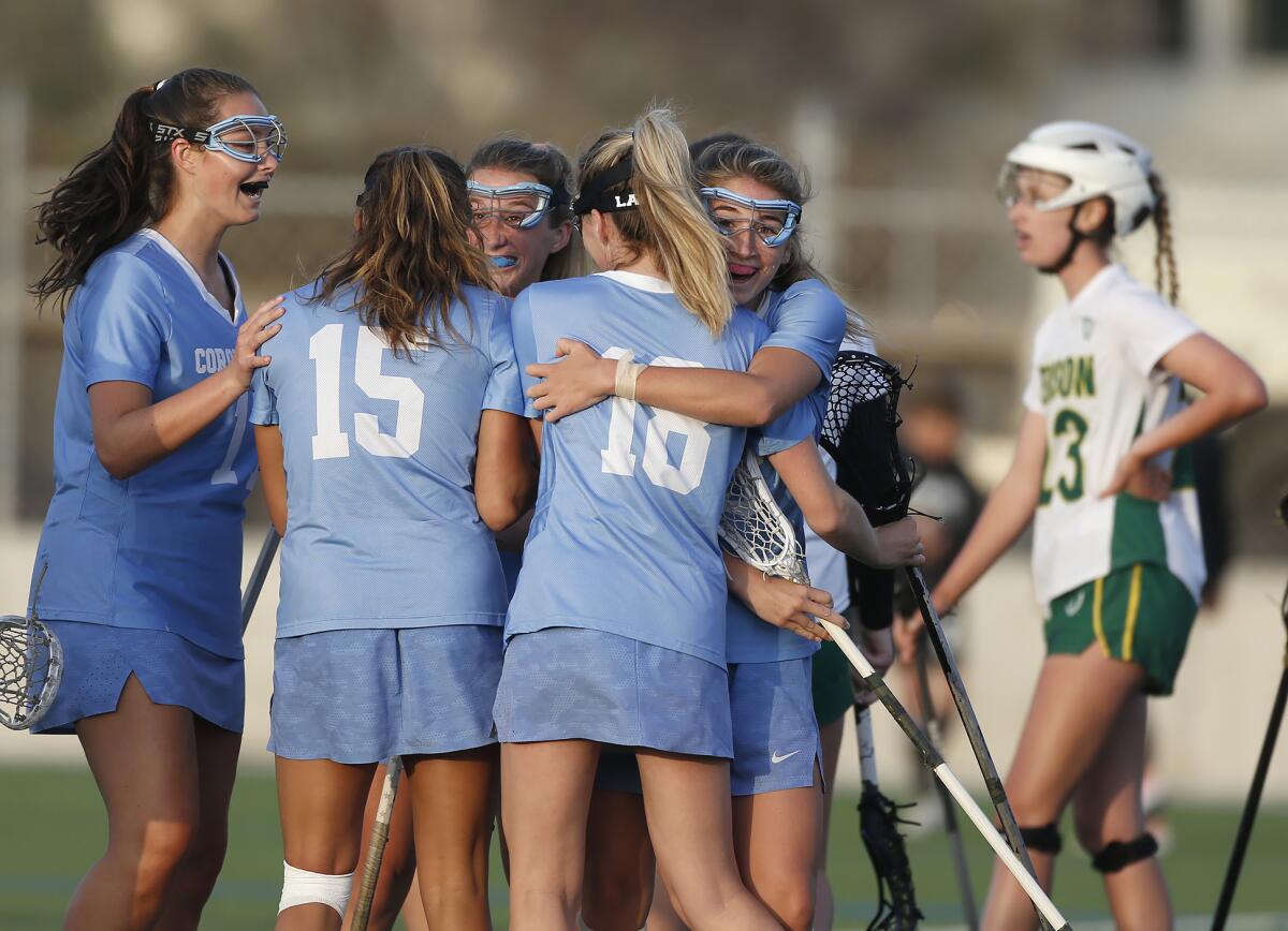 Corona del Mar celebrates a goal by Katie Sullivan (18) as they mount a comeback on Tuesday.
