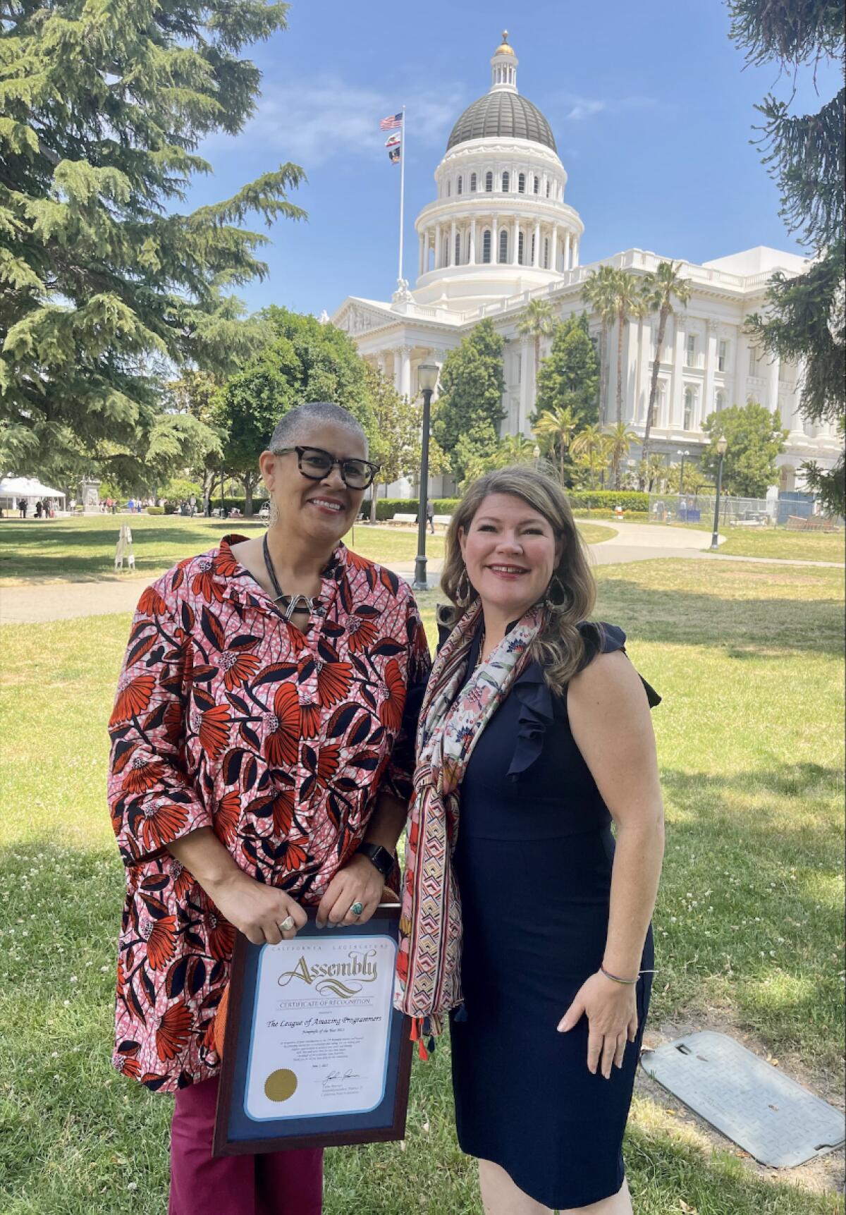 Sarah Tuakli Cooper, executive director of The League of Amazing Programmers, with Assemblymember Tasha Boerner.