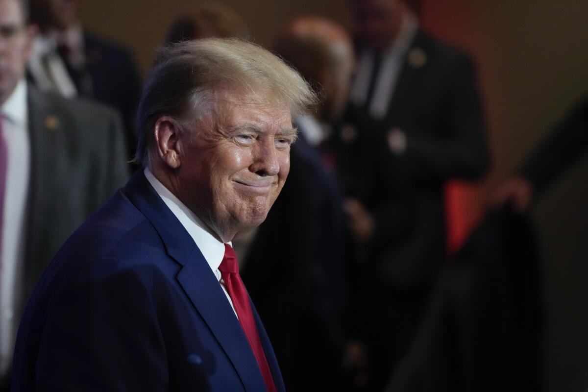 Republican presidential candidate former President  Trump smiles