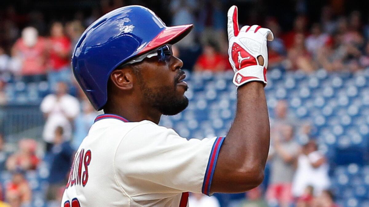 Philadelphia Phillies shortstop Jimmy Rollins celebrates after hitting a two-run home run against the St. Louis Cardinals on Aug. 24. Rollins wants to be a leader on and off the field for the Dodgers.