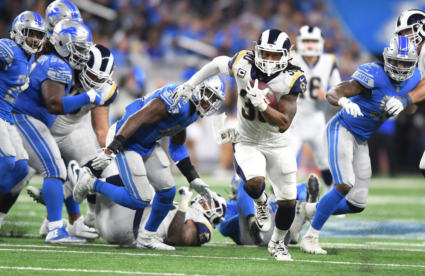 Rams running back Todd Gurley breaks free from the Detroit Lions defense but stops short of the goal line to kill time on the clock late in the fourth quarter at Ford Field in Detroit on Sunday.