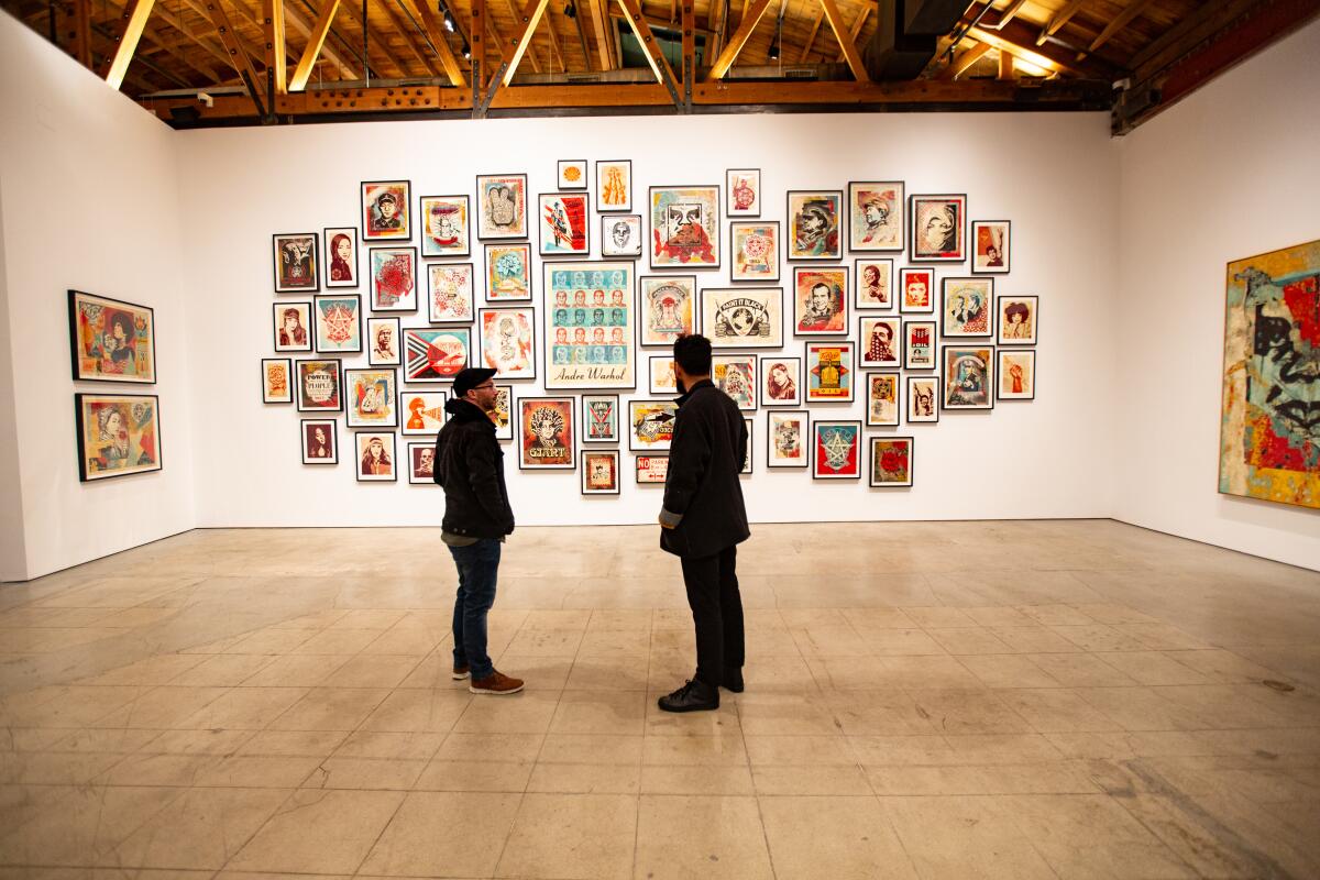 Shepard Fairey's 30-year retrospective, “Facing the Giant: Three Decades of Dissent,” at Over the Influence Gallery.