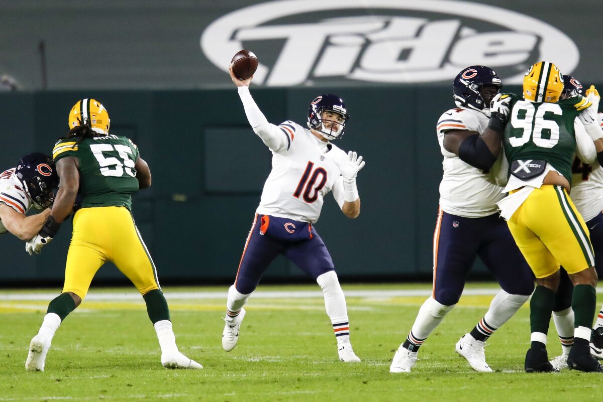 Chicago Bears' Mitchell Trubisky thorws during the first half of an NFL football game against the Green Bay Packers Sunday, Nov. 29, 2020, in Green Bay, Wis. (AP Photo/Matt Ludtke)