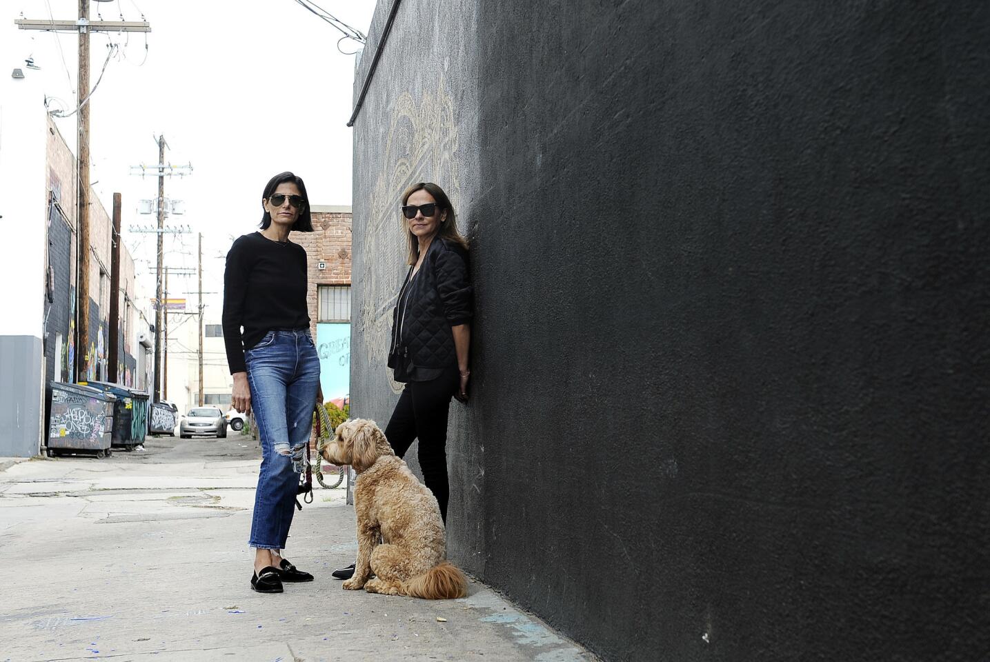 Maryam and Majan Malakpour are sisters and owners of the luxury brand Newbark. Here they are seen with Peaches.