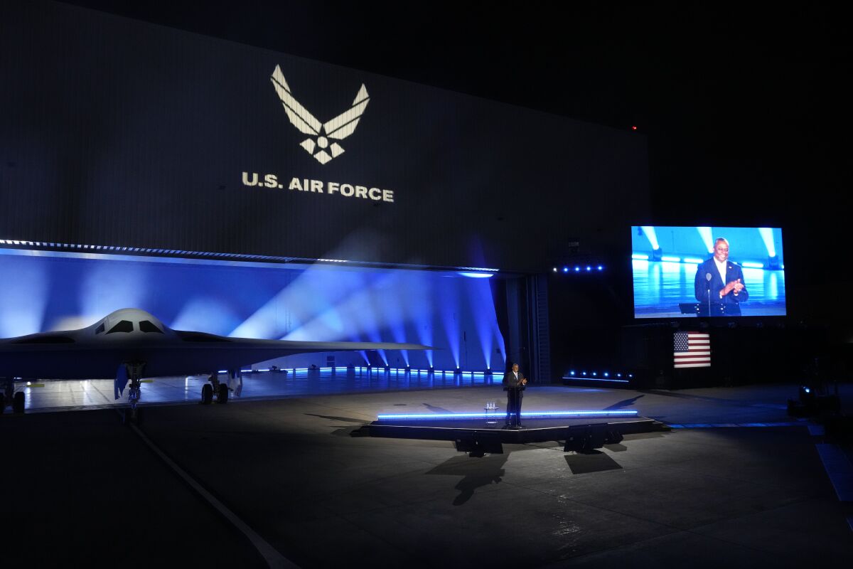 Secretary of Defense Lloyd Austin introduces the B-21 Raider stealth at Northrop Grumman on Friday, Dec. 2.