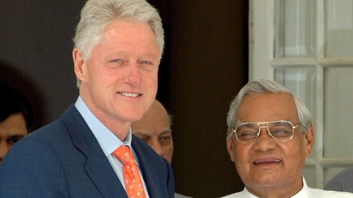 President Clinton shakes hands with former Indian Prime Minister Atal Bihari Vajpayee in New Delhi, India, in 2005.