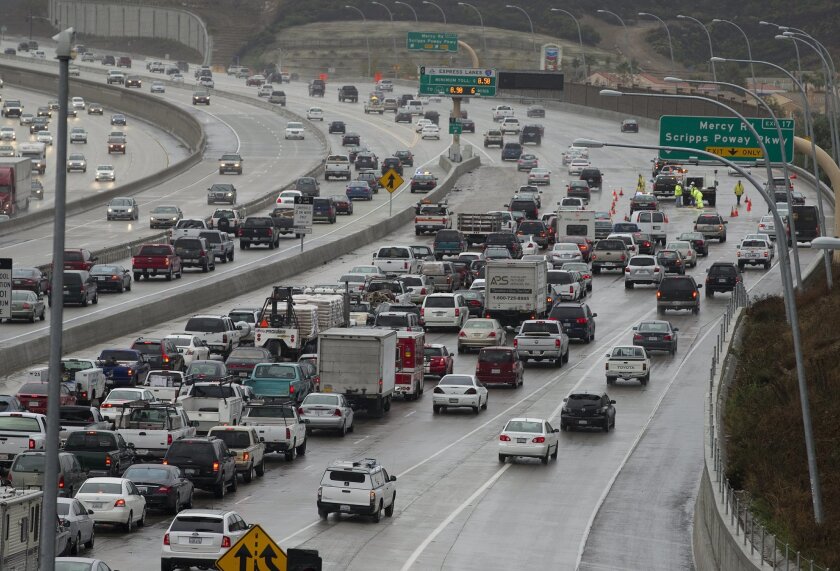 Traffic backs up on southbound Interstate 15 just north of Mercy Road, where solo drivers can buy into the carpool lane, which has variable pricing based on traffic congestion.  