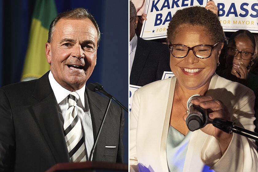 L.A. mayoral candidates Rick Caruso and Karen Bass on election night.