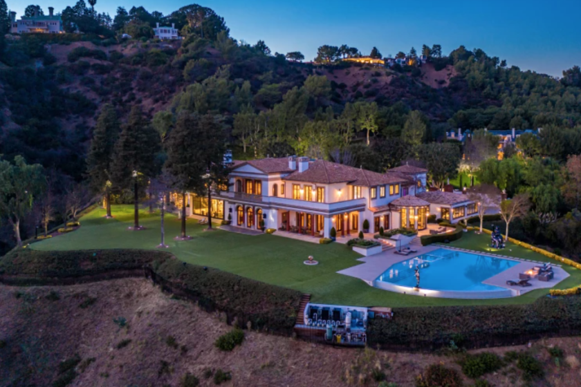 The 21,000-square-foot home sits on 3.5 acres with views of the city below.