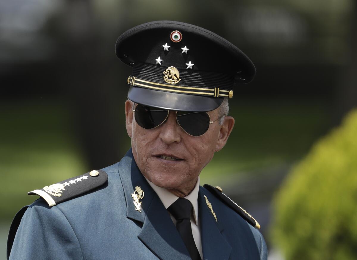 Former Mexican Defense Secretary Salvador Cienfuegos Zepeda in uniform and sunglasses