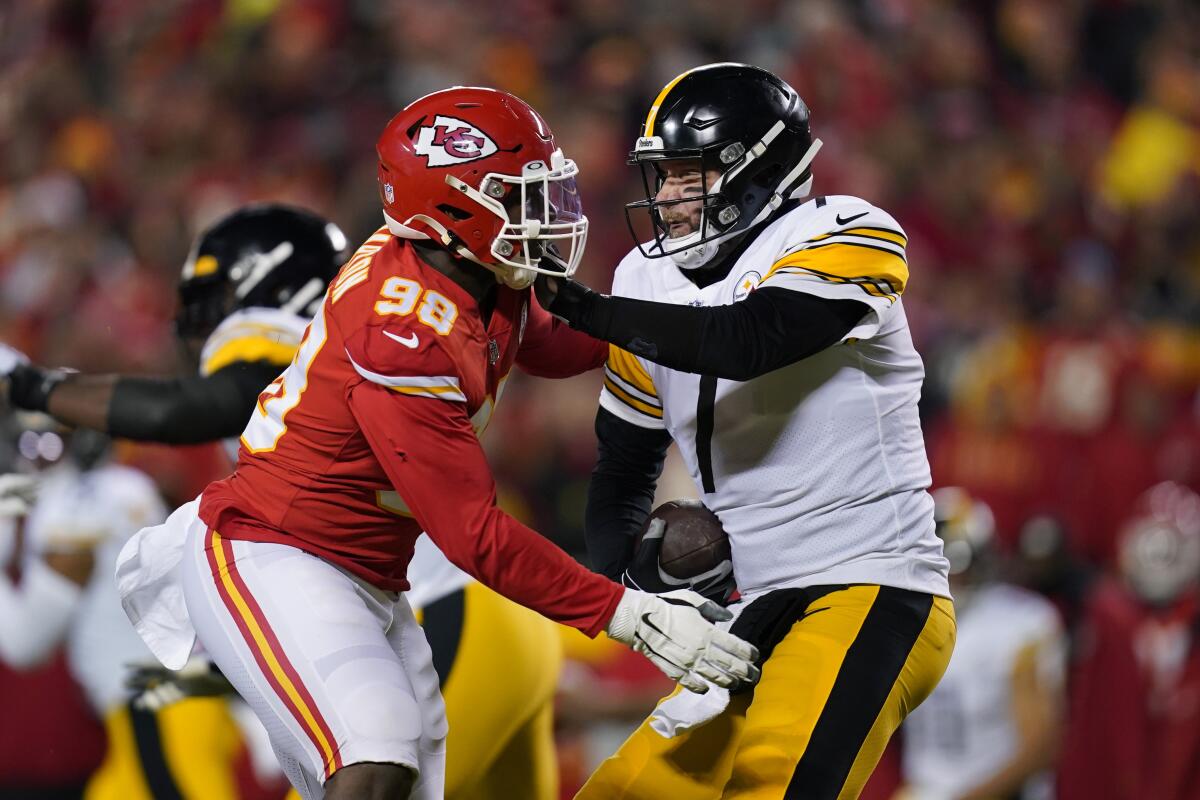 Pittsburgh Steelers quarterback Ben Roethlisberger (7) is sacked by Kansas City Chiefs defensive end Tershawn Wharton (98) during the first half of an NFL wild-card playoff football game, Sunday, Jan. 16, 2022, in Kansas City, Mo. (AP Photo/Ed Zurga)