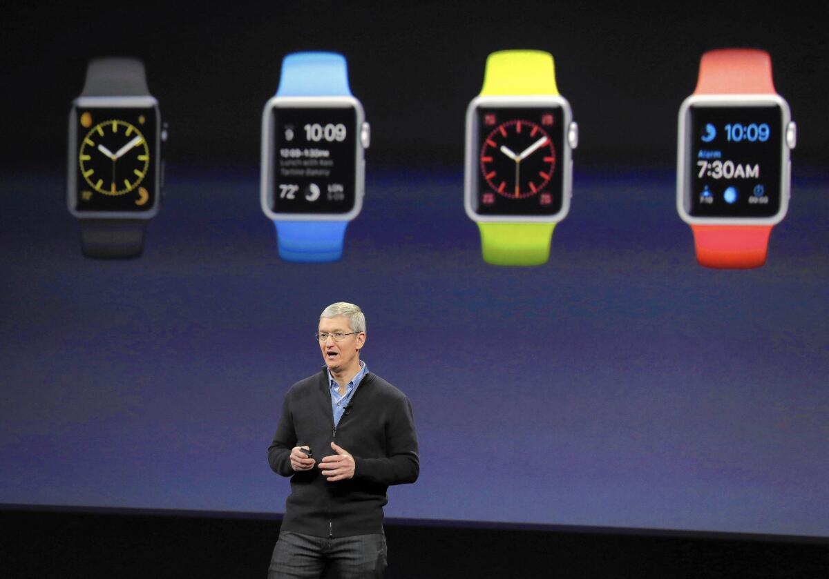 Apple's September event by tradition spotlights the newest iPhones. Above, Apple CEO Tim Cook talks about the Apple Watch during an event in March.