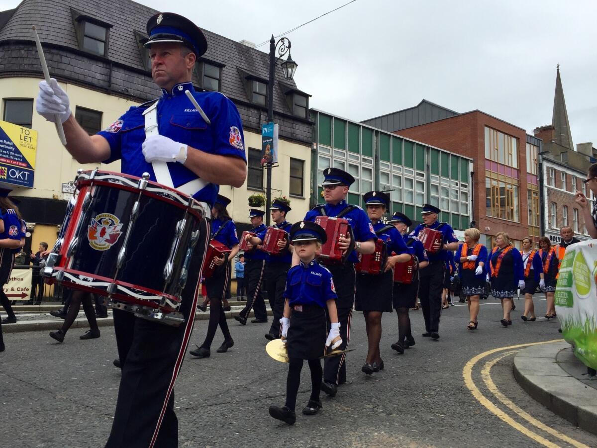 A Protestant marching band parades through Londonderry, Northern Ireland.