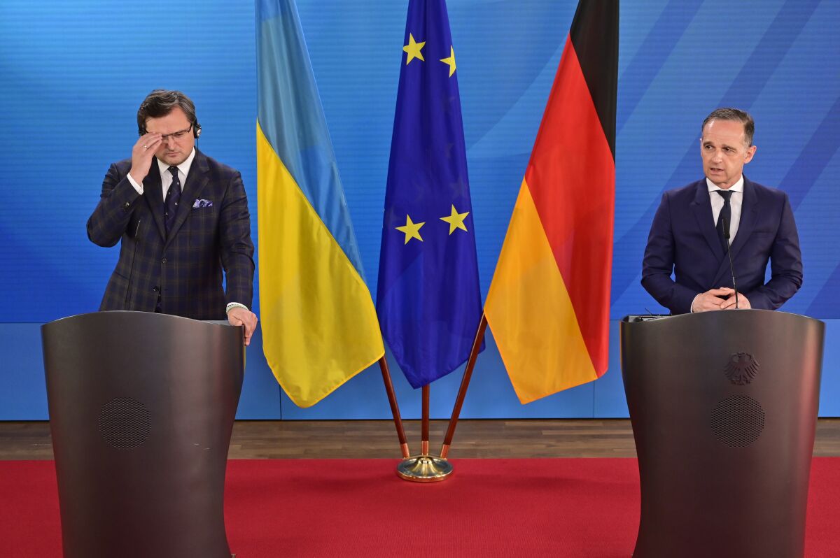 German Foreign Minister Heiko Maas, right, speaks during a joint press conference with Ukraine's Foreign Minister Dmytro Kuleba, in Berlin, Germany, on Wednesday June 9, 2021. (John Macdougall/Pool via AP)