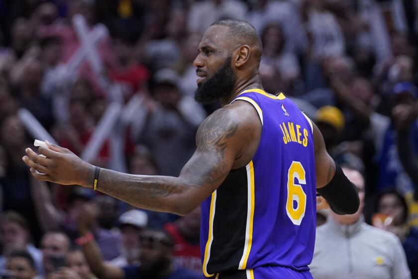 Los Angeles Lakers forward LeBron James (6) reacts after being called for goaltending late.