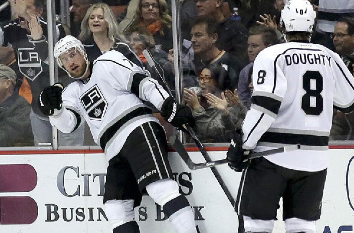 Kings center Jeff Carter celebrates a goal with defenseman Drew Doughty during a game against the Ducks earlier this season in Anaheim.
