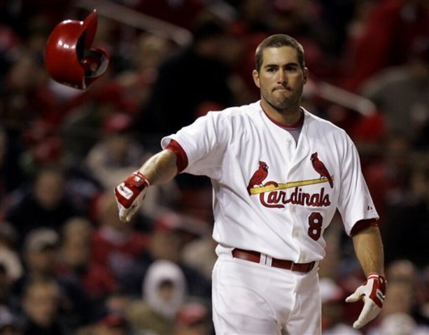 In this April 1, 2008, file photo, St. Louis Cardinals' Troy Glaus tosses his batting helmet after striking out in a baseball game against the Colorado Rockies in St. Louis. Glaus is expected to miss at least two months following a setback in his rehabilitation from arthroscopic shoulder surgery in January. (AP Photo/Jeff Roberson, File)