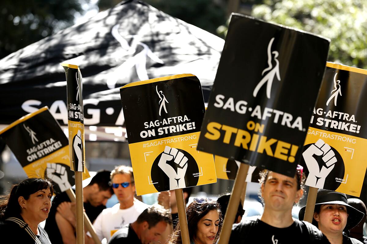 SAG-AFTRA members and supporters on the picket line as the SAG-AFTRA Union Strike continues in front of NBC Studios