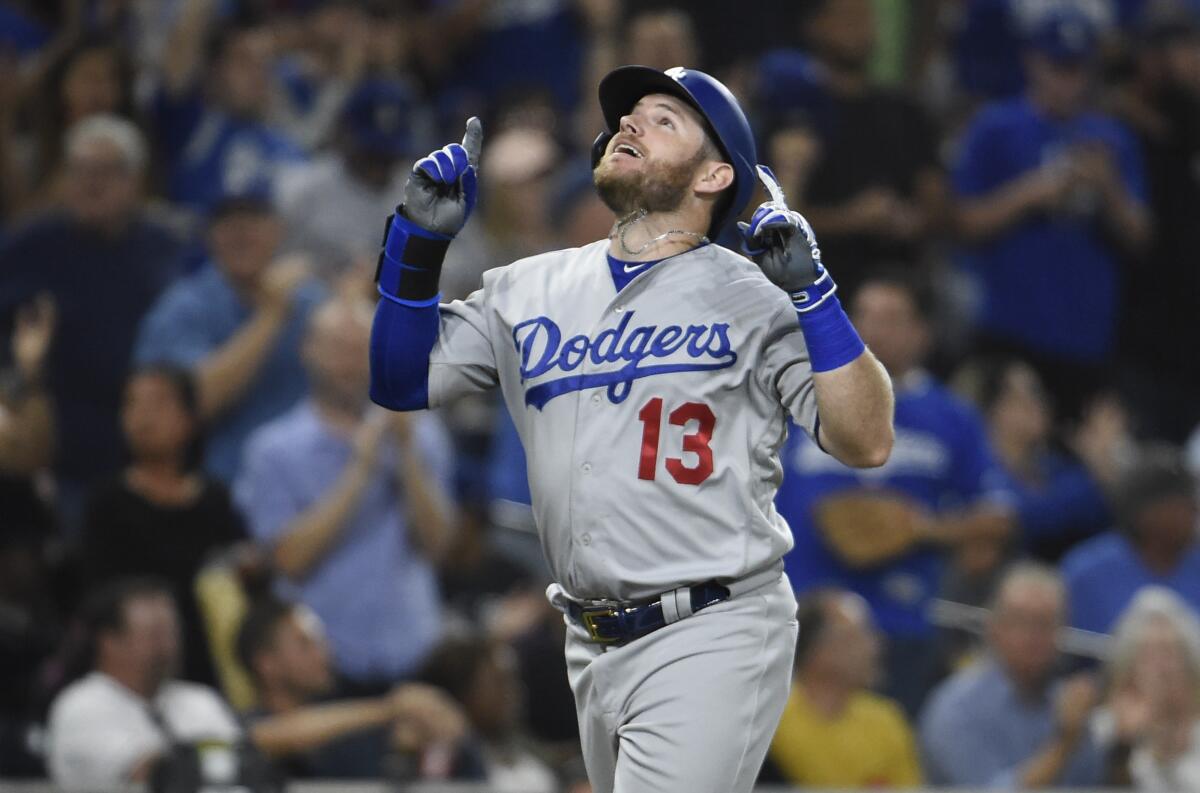 Dodgers first baseman Max Muncy celebrates after hitting a grand slam.