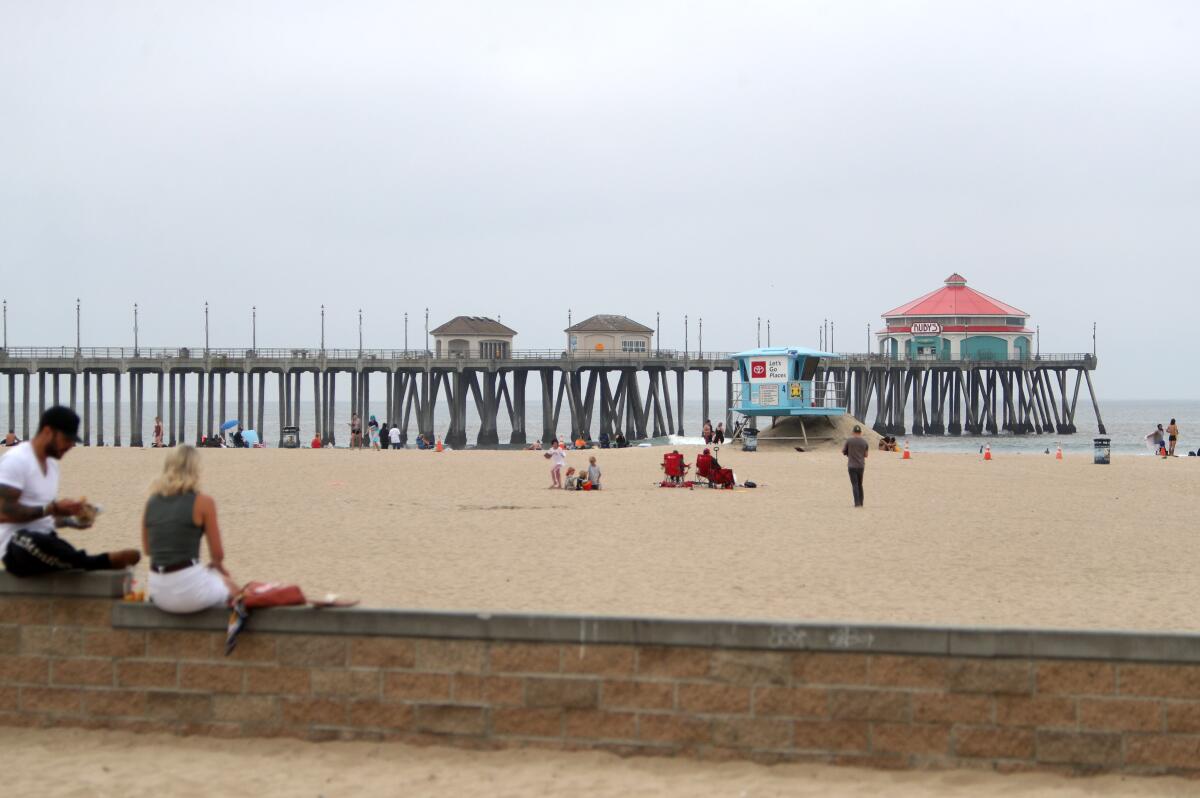 Light crowds were on the sand at Huntington City Beach.