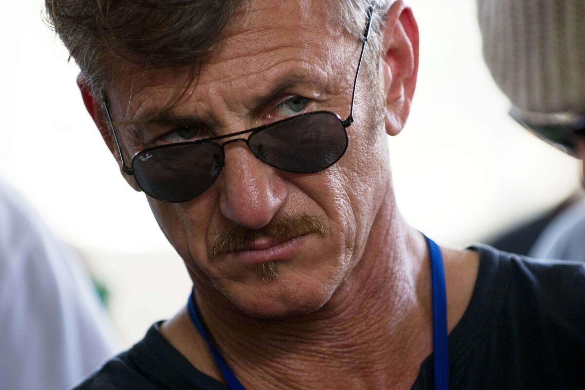 Sean Penn tours the Lime Nursery and Grafting Project in Mirebalais, in the central plateau of Haiti.