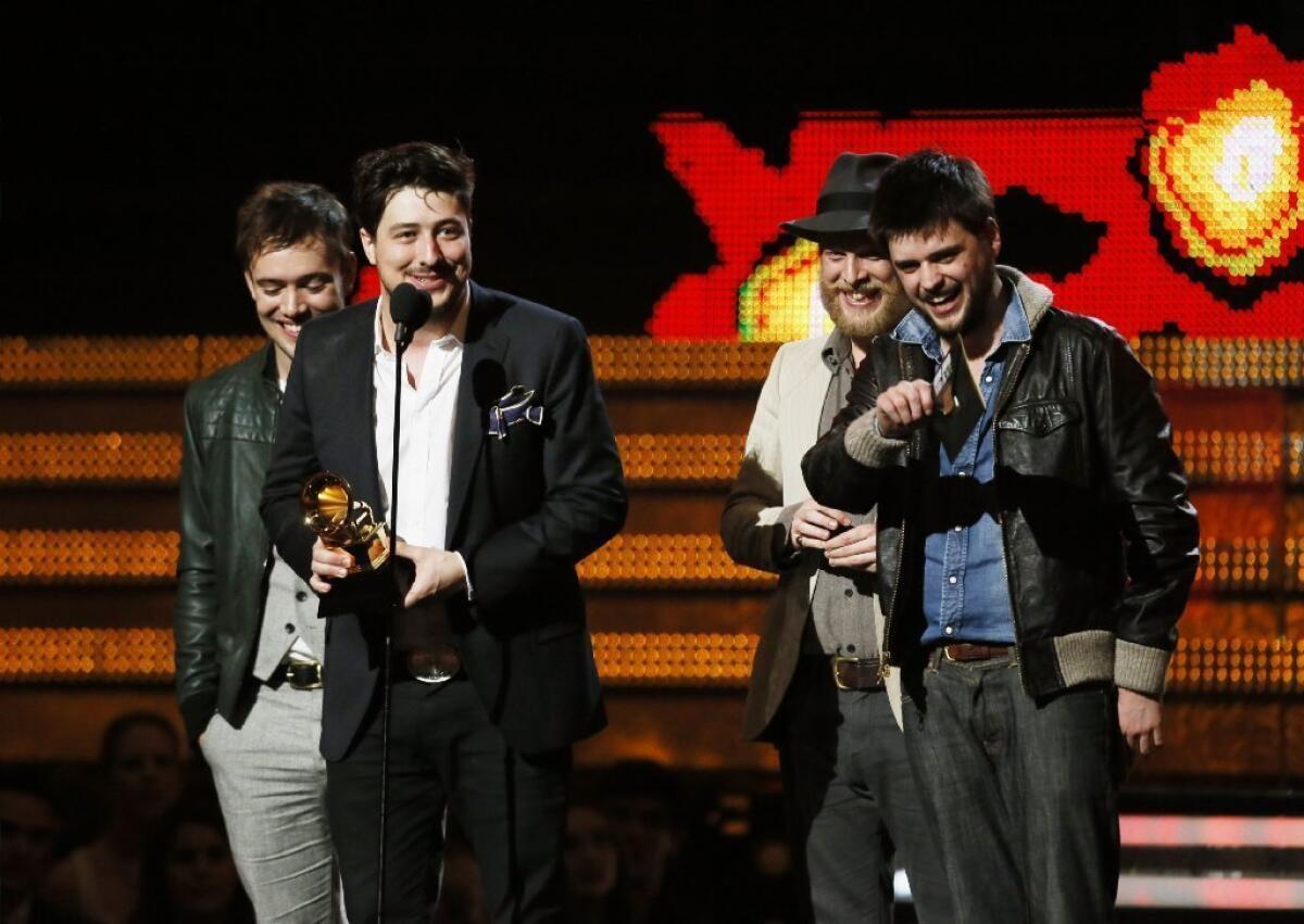 Mumford & Sons on stage at the 55th Annual Grammy Awards.