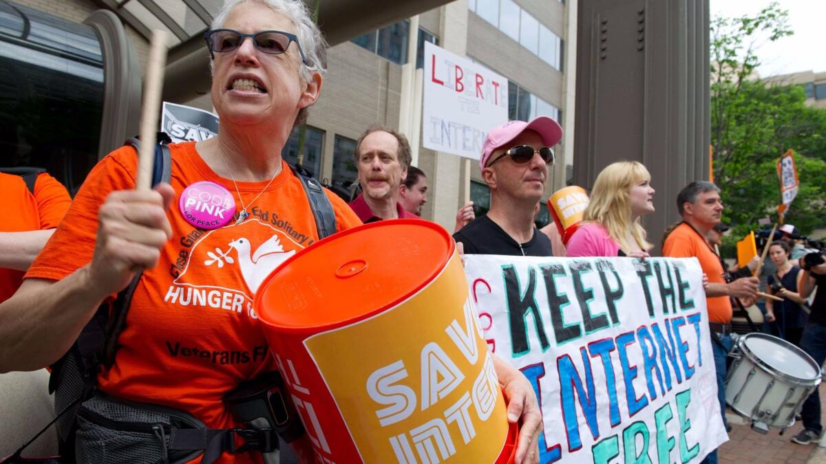 Protesters hold a rally to support net neutrality outside the Federal Communications Commission's headquarters in Washington, D.C., on May 15, 2014. (Karen Bleier / AFP/Getty Images)