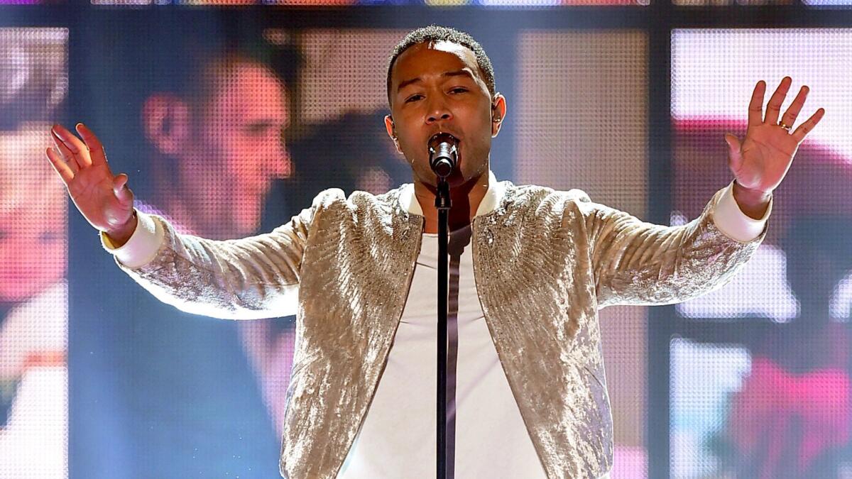 John Legend performs "Love Me Now."