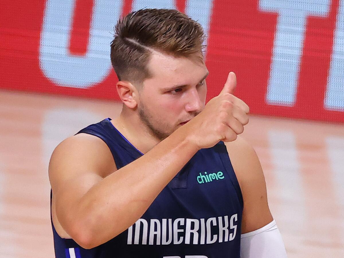 Dallas Mavericks star Luka Doncic gives a thumbs-up during the second quarter of Game 4 against the Clippers.