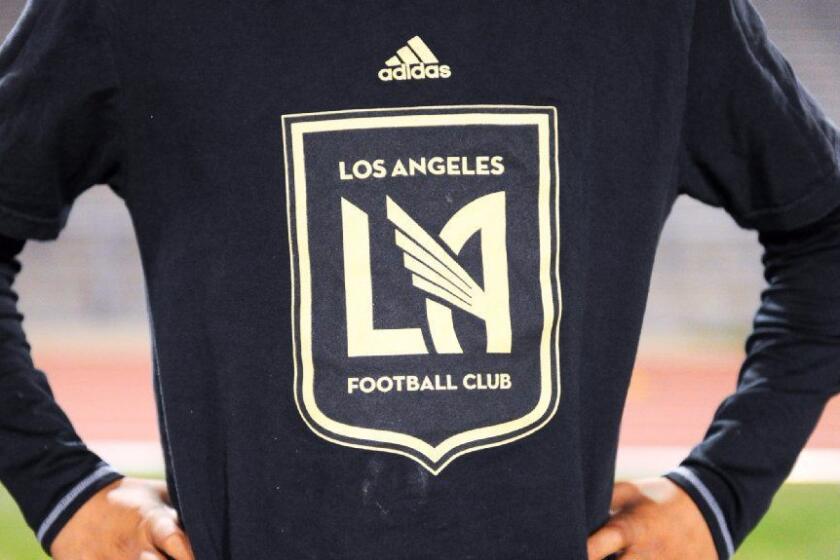 A youth wears a Los Angeles Football Club shirt during LAFC soccer academy practice at Cal State L.A.