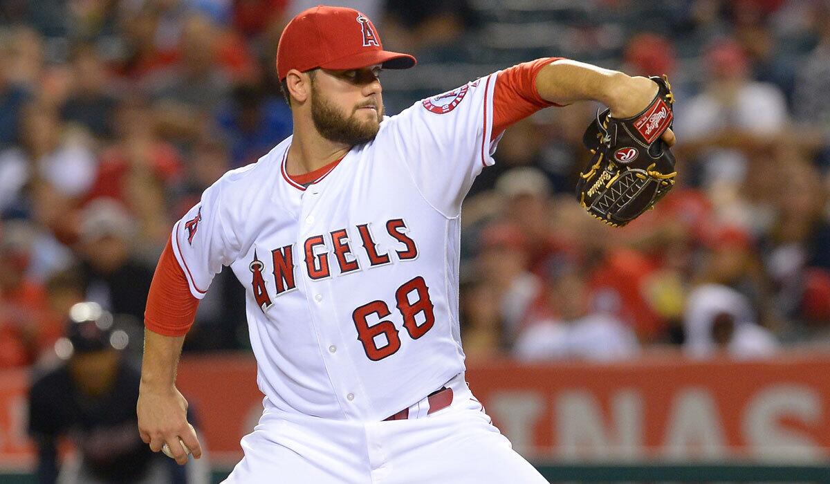 Angels' Cam Bedrosian pitches against Cleveland on June 10.