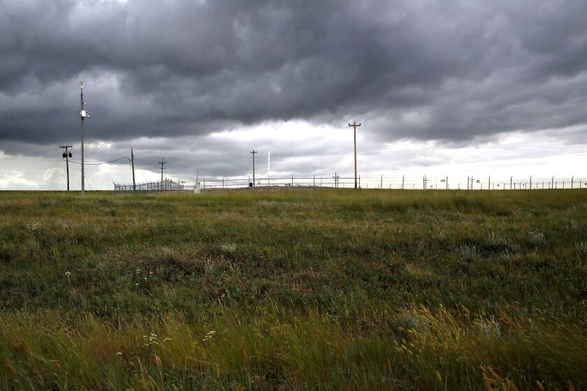 North of Great Falls, Mont., a small lot surrounded by a chain-link fence indicates a nuclear missile silo underground.