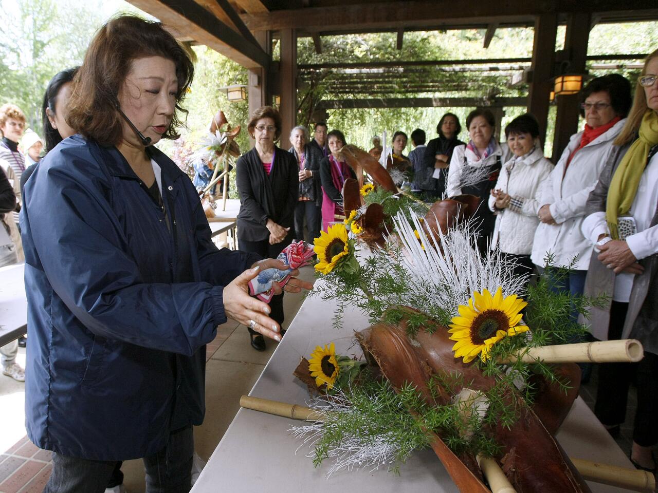 Iemoto (Head Master) Akane Teshigahara gives critique of an Ikebana (Japanese flower arrangement) on the last day of Sogetsu School's North American International Flower Arranging and Performance Seminar at Descanso Gardens in La Canada Flintridge on Tuesday, April 30, 2013. Dozens of conference participants from around the world gathered at Descanso Gardens for the quadrennial event.
