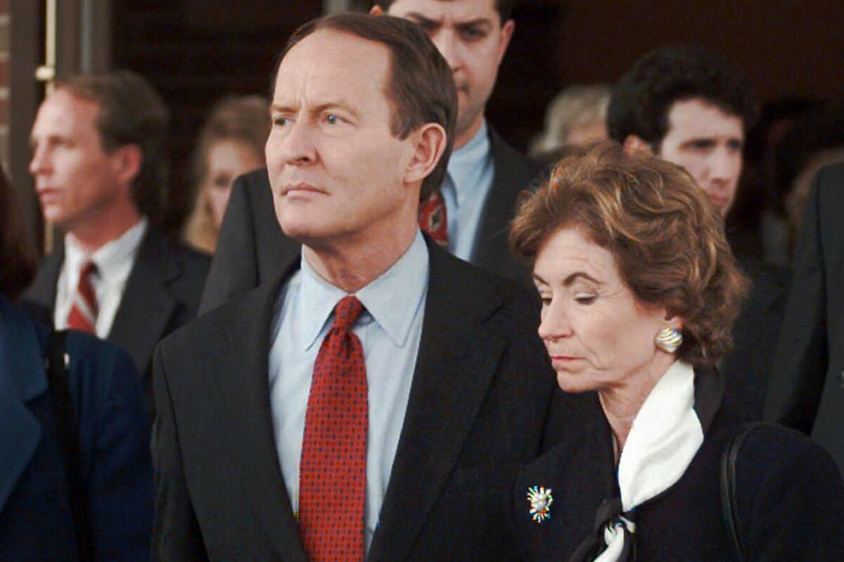 FILE - Lamar Alexander, left, and his wife Honey, leave funeral services for Sarah Cannon, better known as Minnie Pearl, at Brentwood United Methodist Church in Brentwood, Tenn. Wednesday, March 6, 1996. The family of former Tennessee governor and U.S. Sen. Lamar Alexander says his wife of 53 years has died at age 77. Known as “Honey,” Leslee Kathryn Buhler Alexander died surrounded by her family on Saturday, Oct. 29, 2022 at her home outside Maryville, Tenn. (AP Photo/Beth A. Keiser)